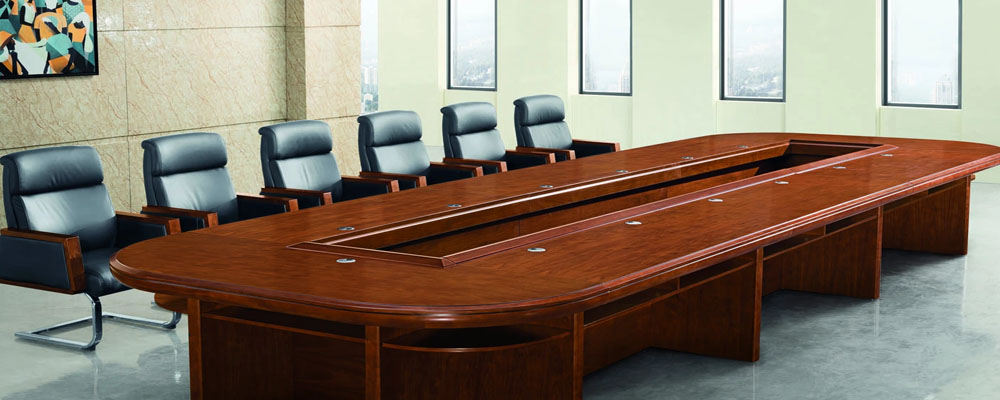 Modern office table with a sleek wooden finish for professional workspaces.