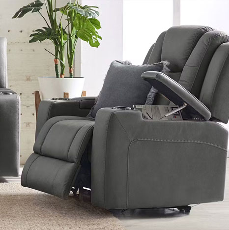 Electric recliner with an adjustable headrest and footrest for customized comfort.